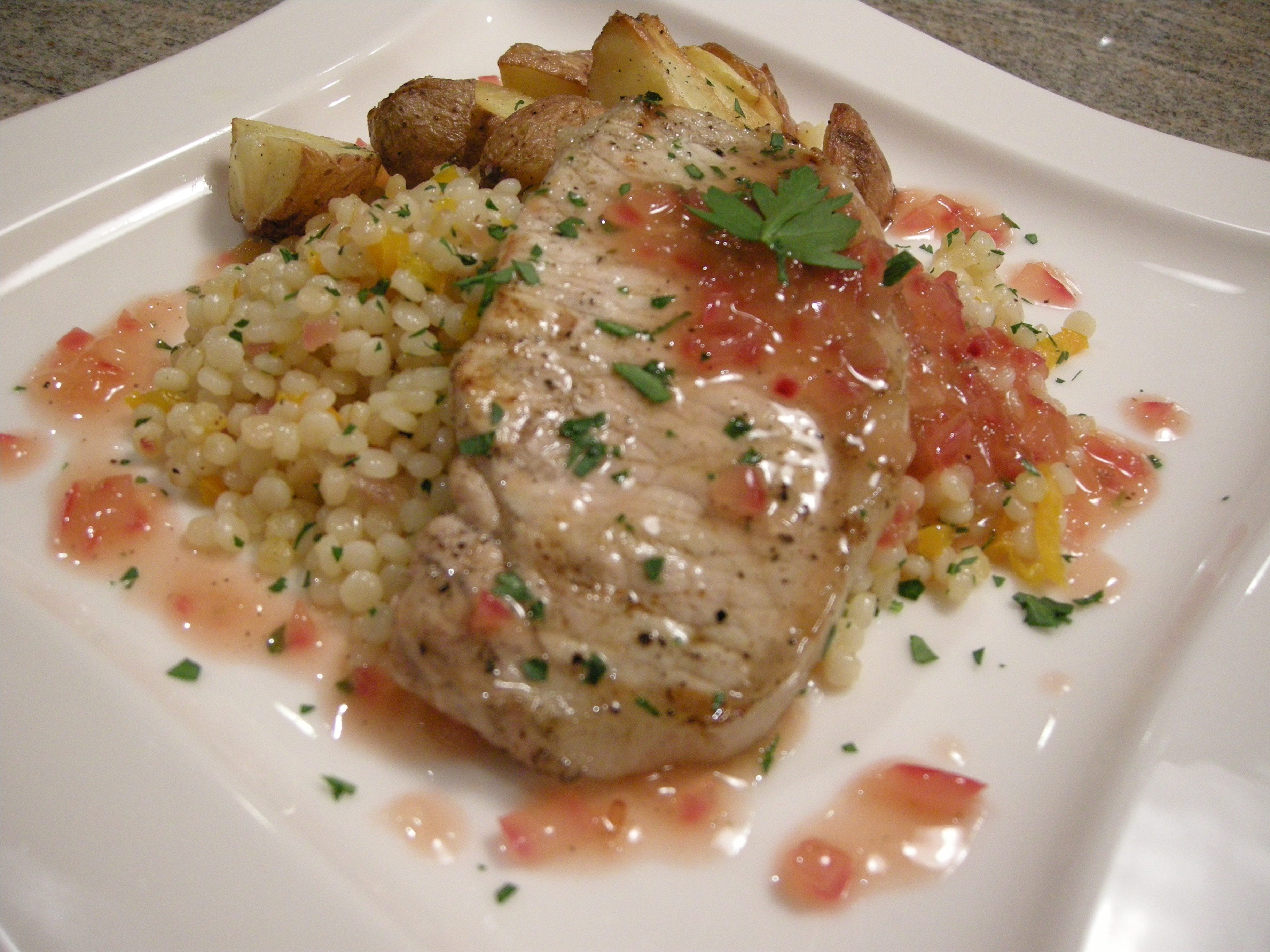 Grilled Pork Chops w/Tokaji Wine Reduction Sauce, Couscous Salad & Roasted Potatoes Grilled Pork Chops w/Tokaji Wine Reduction Sauce, Couscous Salad & Roasted Potatoes picture