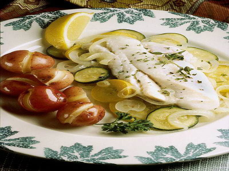 Haddock Steamed In Lettuce Leaves Haddock Steamed In Lettuce Leaves picture