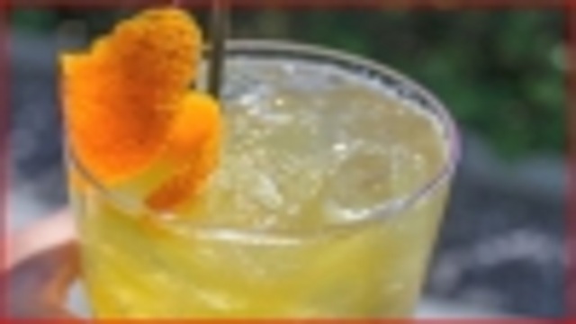 Bourbon, Fresh Ginger and Orange Cocktail Bourbon, Fresh Ginger and Orange Cocktail picture