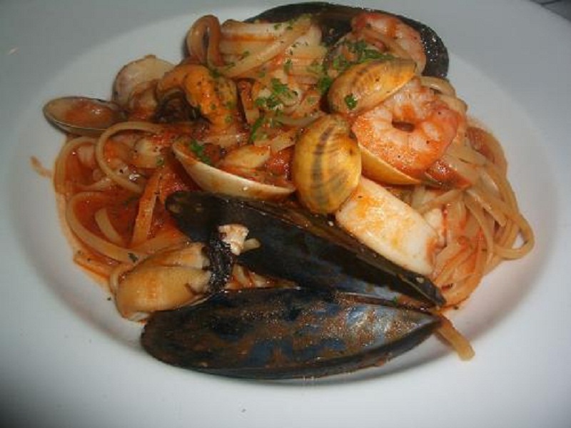 Bucatini with Tomatoes and Seafood Bucatini with Tomatoes and Seafood picture
