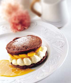 Chocolate Pancakes With Mango Yoghurt Chocolate Pancakes With Mango Yoghurt picture