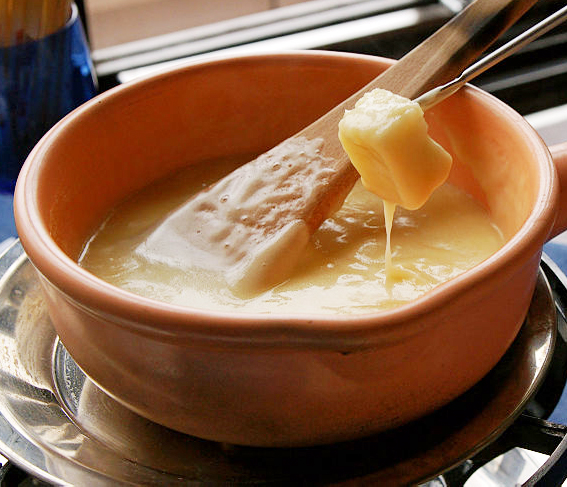 Family-Style Swiss Cheese Fondue Family-Style Swiss Cheese Fondue picture