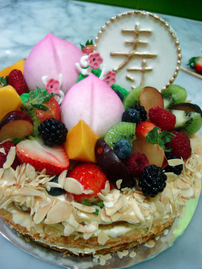 Longevity Buns used to decorate a fruit cake. Longevity Buns used to decorate a fruit cake.