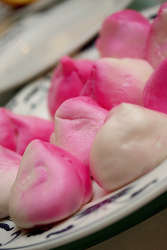 An set of freshly steamed longevity peach buns. An set of freshly steamed longevity peach buns.