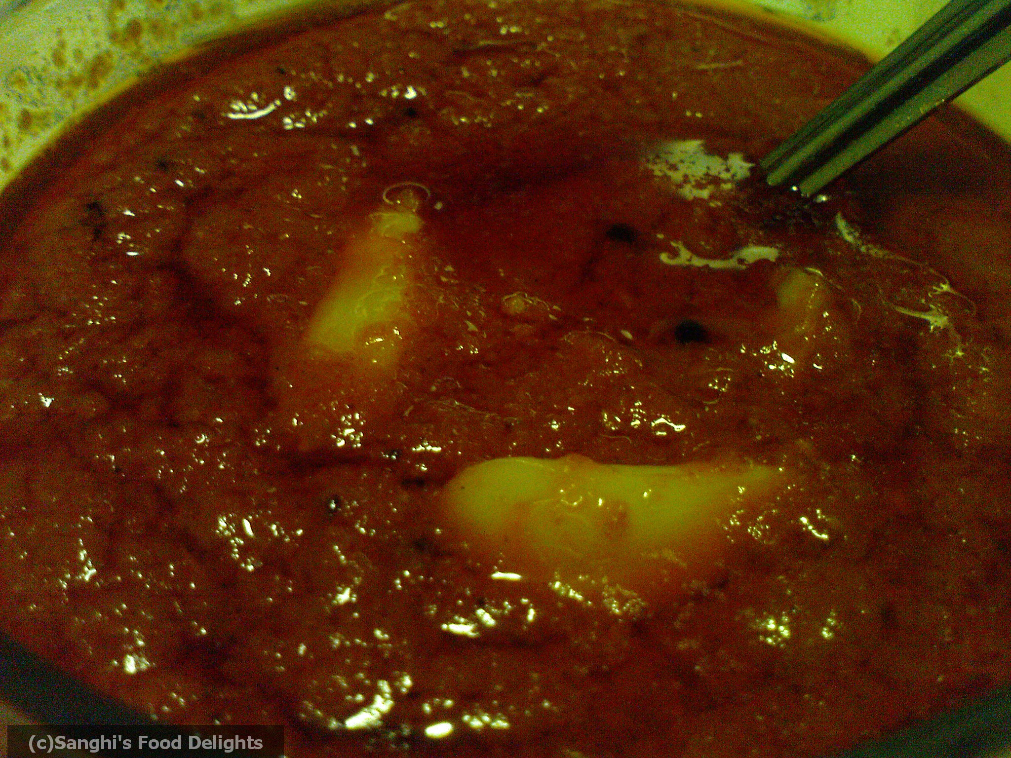 Thakkali Poondu Thokku Thakkali Poondu Thokku picture