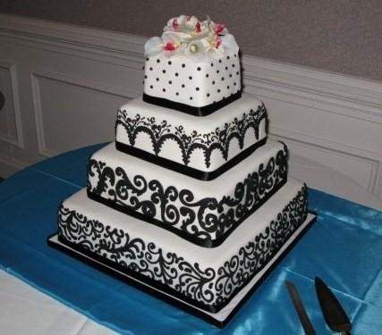 Four Tier Wedding Cake Black and White with Colorful Flowers