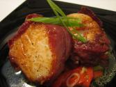 Diver Scallops Wrapped In Jamón Over Piquillo Pepper Salad
