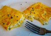 Thin Italian Omelette Filled With Goat Cheese And Chives.