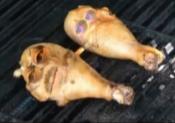 Two Hot Chicken Legs On The Grill