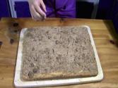 The Aubergine Chef's Releasing Cake From A Sheet Pan Using The Brownie Method
