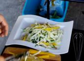 Cabbage And Yellow Carrot Slaw With Raisins And Pine Nuts