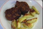 Tuna Fish Burger With Baked Potatoes On Gorgonzola Cheese Sauce
