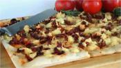 Focaccia Bread With Sun Dried Tomatoes And Cheese Topping