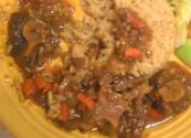 Sauteed Oxtails In Guyanese Style With Rice And Peas