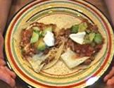 Huevos Rancheros With Refried Beans And Fried Eggs