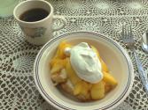 Angel Food Cake With Sliced Peaches And Strawberry Sauce 