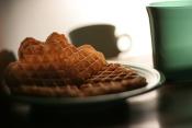 Whole Wheat Waffles With Butter And Maple Syrup