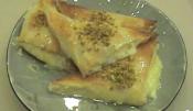 Lebanese Sweet Phyllo Triangles Stuffed With Custard 