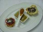 Marinara Served With Mushroom Ragout Filled In Phyllo Baskets And Tian Of Goat Cheese And Peppers