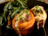 Pan Seared Striploin In Yorkshire Puddings With Bearnaise Sauce And Roasted Pear And Arugula Salad