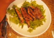 Raw Teriyaki Mushrooms Over Arugula