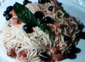 Pasta With Tomatoes Black Olives And Feta Cheese