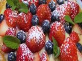 Delicious Strawberry And Blueberry Custard Cream And Almond Tarts