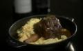 Braised Lamb Shank with Goat Cheese Polenta and Thyme Jus