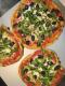 Baked Tomato Slices With Cheese And Basil Leaves