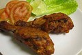 Indian Tandoori Chicken in a Broiler 
