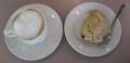 Cup Of Capuccino And A Lemon Blueberry Scone