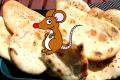 Is That A Mouse In His Bag Of Crispy Tandoori Naan ?