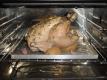 Whole Chicken Roasting In An Oven