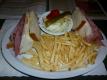Rye Bread With Swiss Cheese And Cole Slaw And French Fries
