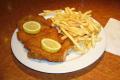 Schnitzel With French Fries And Lemon