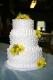 White Wedding Cake With Yellow Flowers