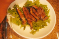 Raw Teriyaki Mushrooms Over Arugula