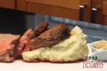 Bone- In Roasted Strip Loin with a side of Bleu Cheese Mashed Potatoes