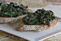Spicy Beet Green Crostini