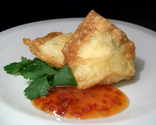 Crab Rangoons are crab meat and cream cheese filled wontons. Crab Rangoons are crab meat and cream cheese filled wontons.