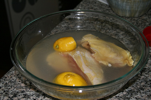 Chicken completely submerged in brine
