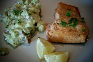 Broiled cod fillets ready to be eaten - sprinkled with lime juice