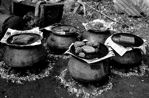 Dampukht cooking in progress - closed vessels cooking meat and rice