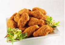 Lovely deep fried chicken wings made very professionaly at home.