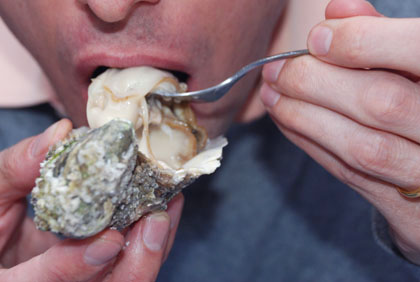 Eating oysters raw can be real fun and delicious