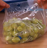Storing grapes in plastic bag in the freezer