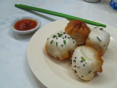 Shengjian Mantou Served with a chili dip. Shengjian Mantou Served with a chili dip.