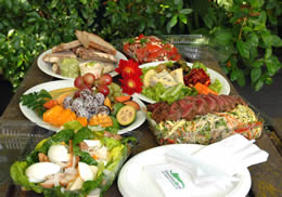 Picnic food includes fruits, cookies