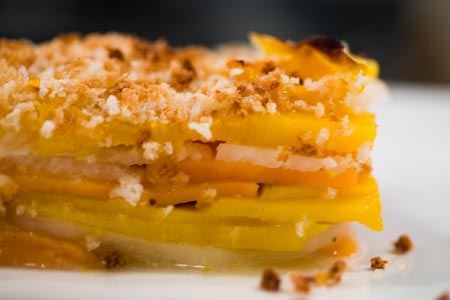 Sumtuous root vegetable gratins ready to be eaten