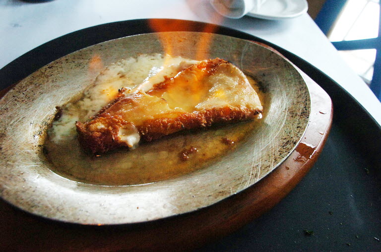 Saganaki served on a sagani